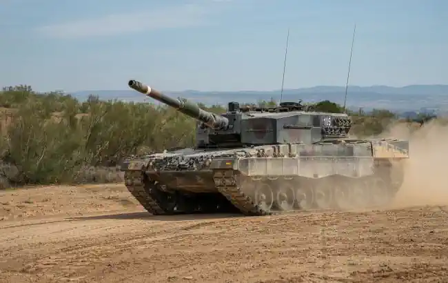 El Pais:      ,   Leopard 2